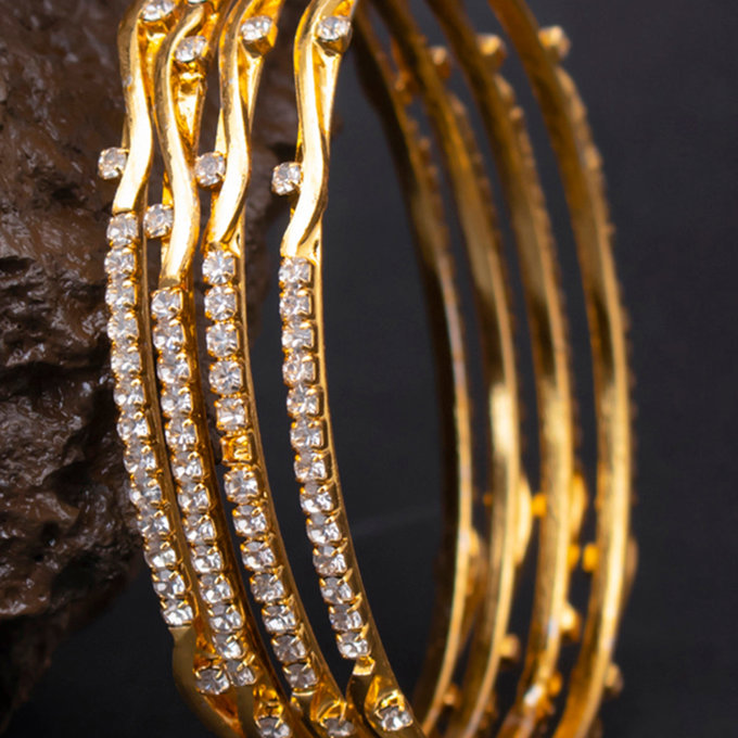 Sukkhi Glorious Gold Plated Ad Stone Bangles Set For Women