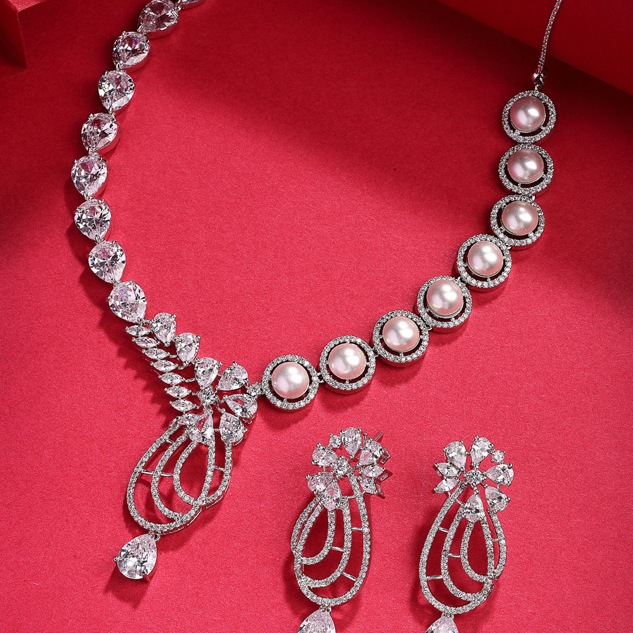 Sukkhi Delicate Tear Drop Round Design Rhodium Plated Cubic Zirconia & Pearl Studded White Brass Collar Necklace & Drop Earrings Jewellery Set for Women