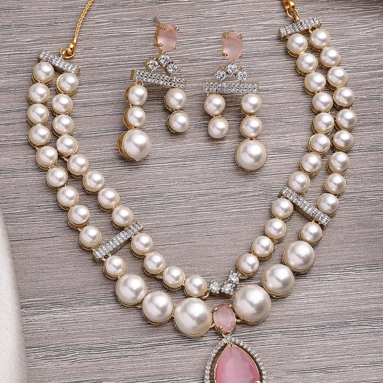 Sukkhi Beautiful Pink Pear Design Gold Plated Cubic Zirconia & Pearl Studded Brass Two Layered Collar Necklace & Drop Earrings Jewellery Set for Women