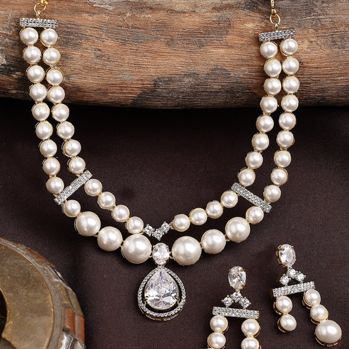 Sukkhi Awesome Stylish Pear Design Gold Plated with CZ & Pearl Studded White Brass Two Layered Collar Necklace & Drop Earrings Jewellery Set for Women