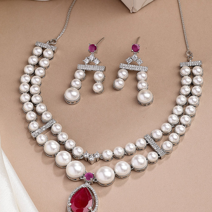 Sukkhi Pretty Red Pear Design Rhodium Plated with CZ & Pearl Studded Brass Two Layered Collar Necklace With Drop Earrings Jewellery Set for Women