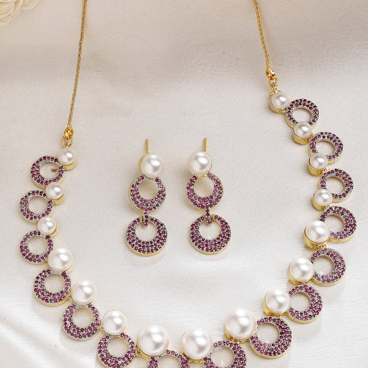 Sukkhi Bewitching Round Design Gold Plated with Cubic Zirconia & Pearl Studded Red Brass Collar Necklace with Drop Earrings Jewellery Set for Women