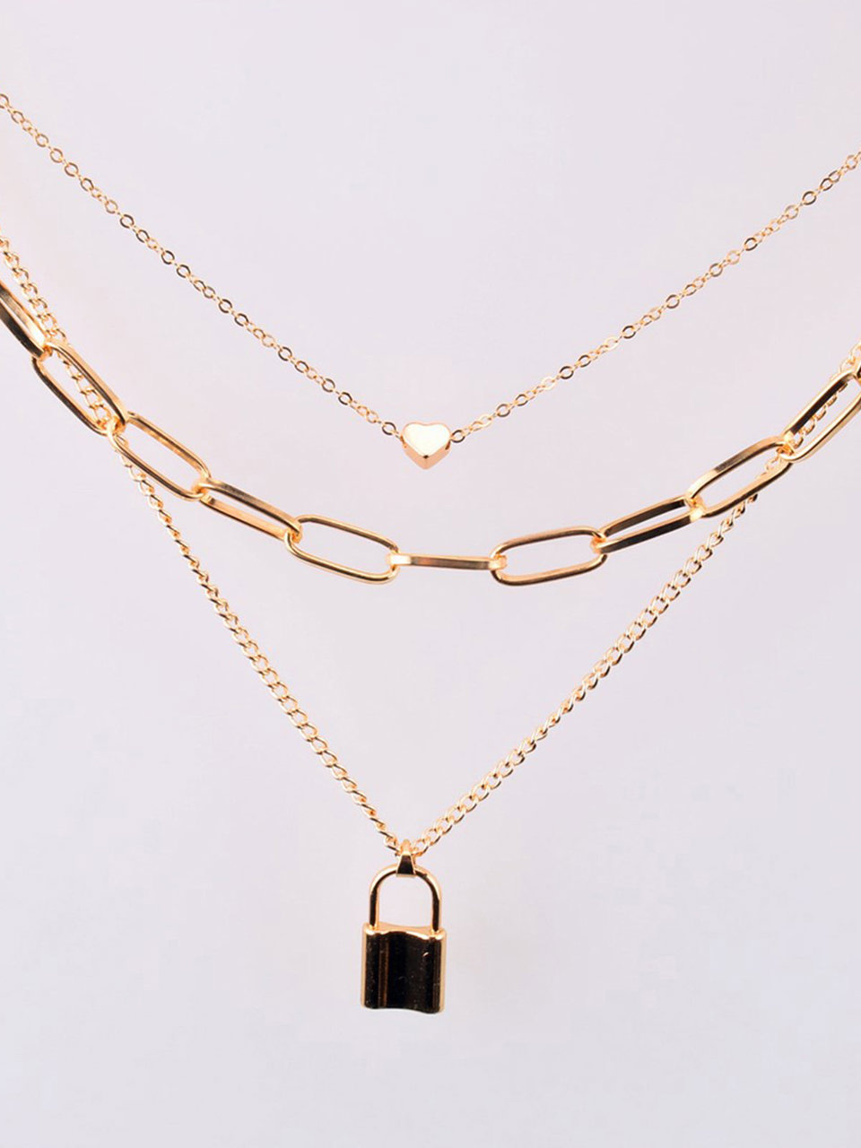 Scintillare by Sukkhi Modish Gold Plated Multi Layered Heart Lock Necklace for Women