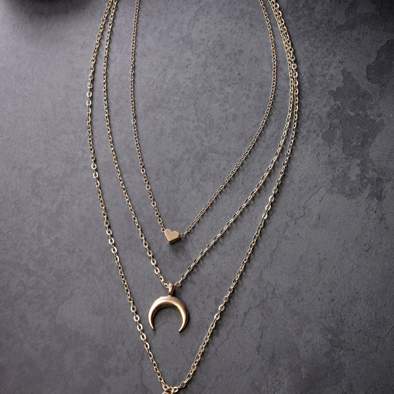 Scintillare by Sukkhi Latest 3 Layered Western Non Precious Base Metal Gold Plated Pendant Necklace for Women
